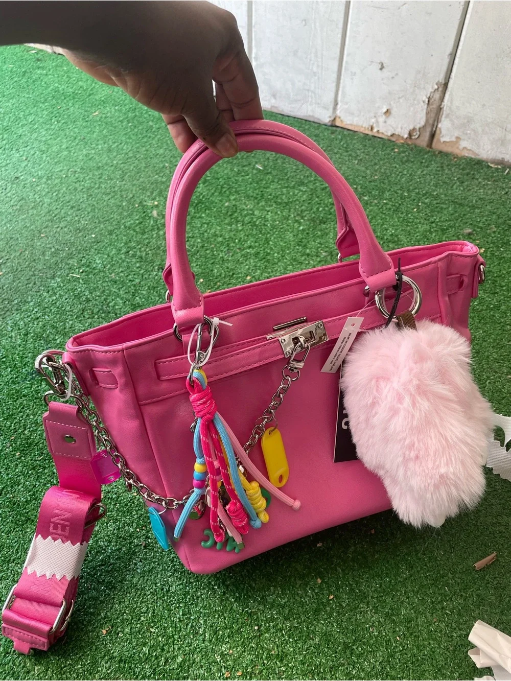 Pink Madden NYC satchelhandbag with plus charm